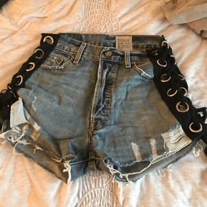 LF carmar denim shorts with lace up holes on side